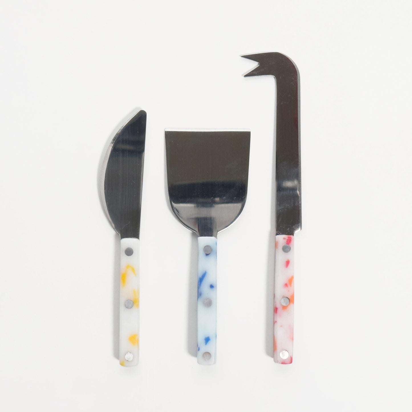 Set of 3 cheese knives, each with a different colored handle -- yellow (soft cheese), blue (semi-soft cheese) and red (hard cheese)