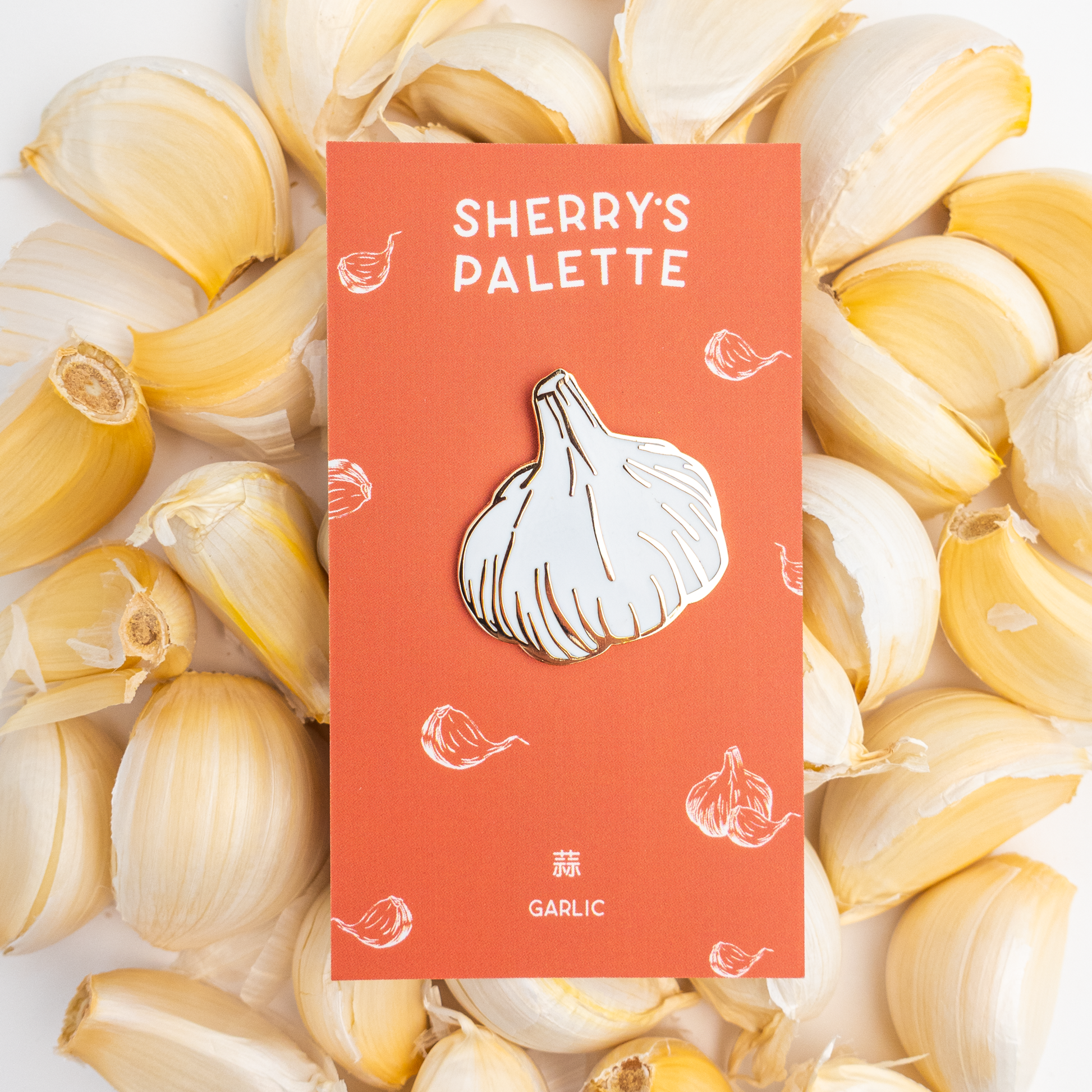 Garlic bulb enamel pin with card backing