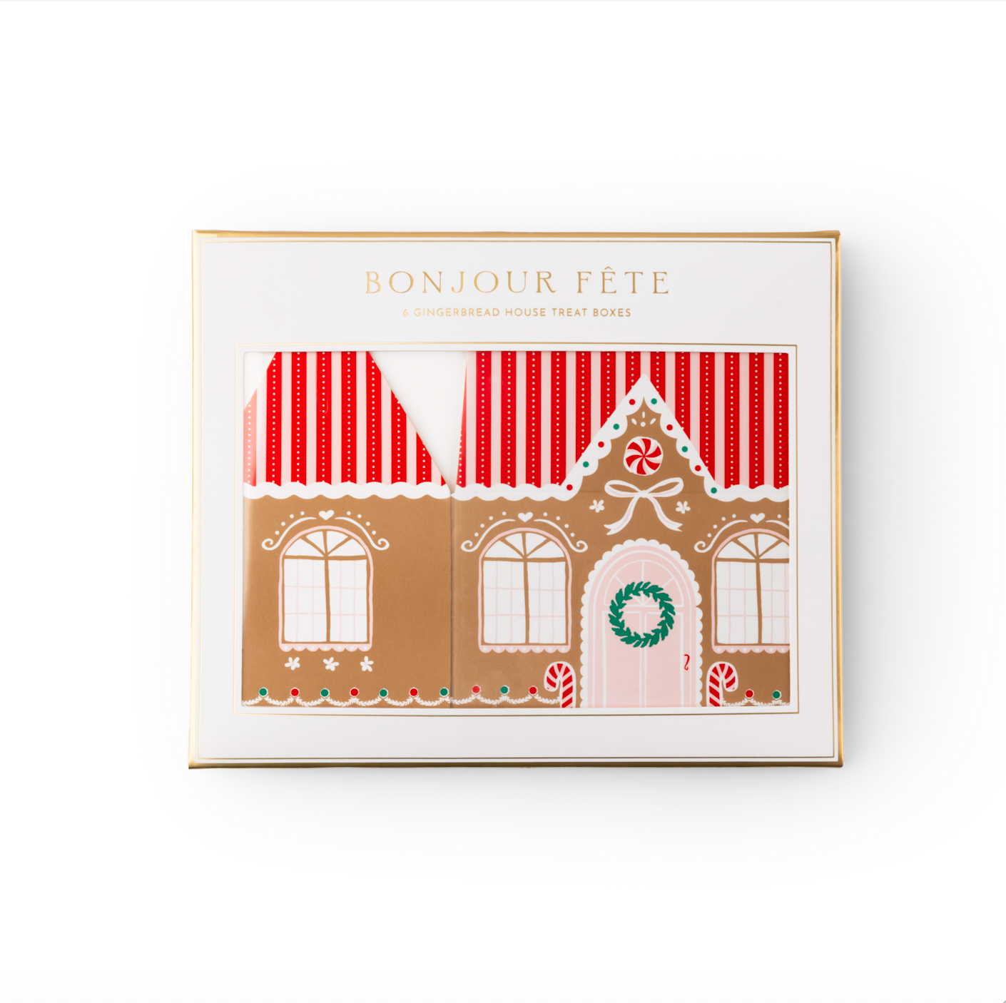boxed packaging of a gingerbread house with 'Bonjour Fète' text on a white background