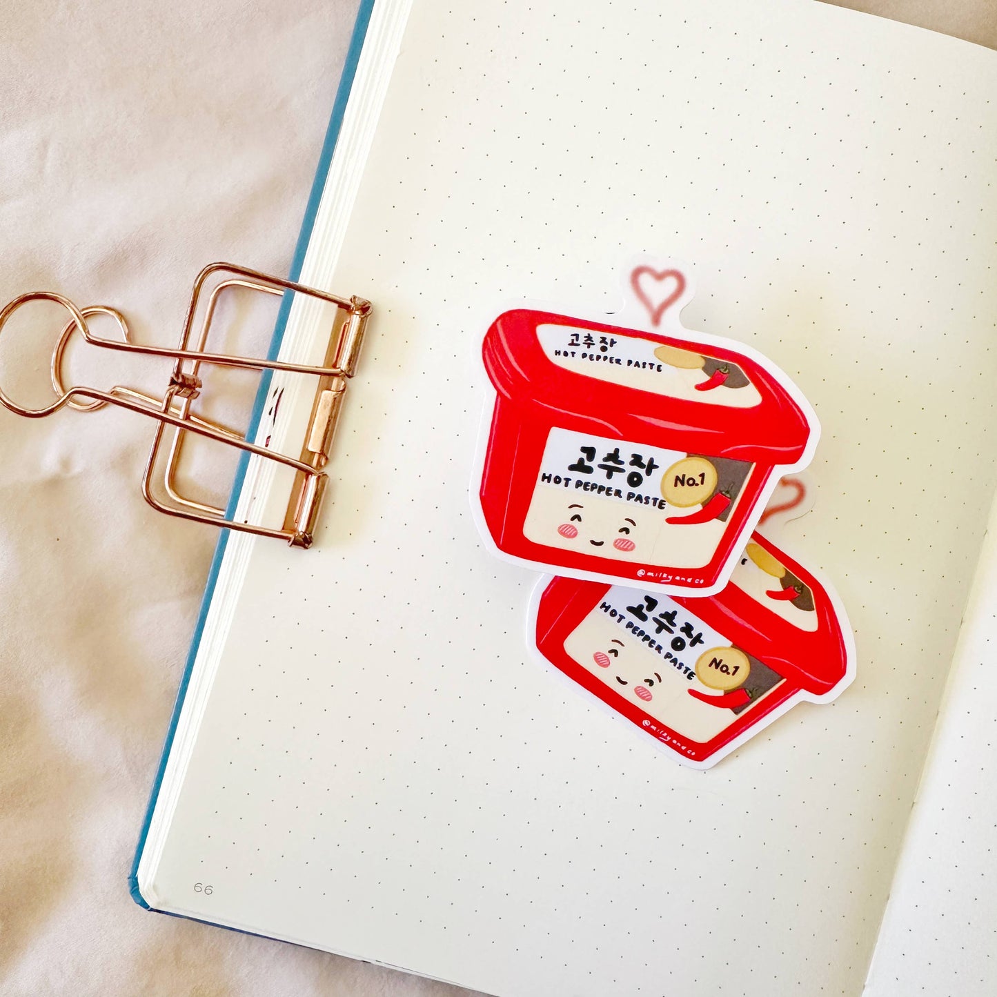 Sticker of a tub of gochujang (Korean spicy pepper paste)