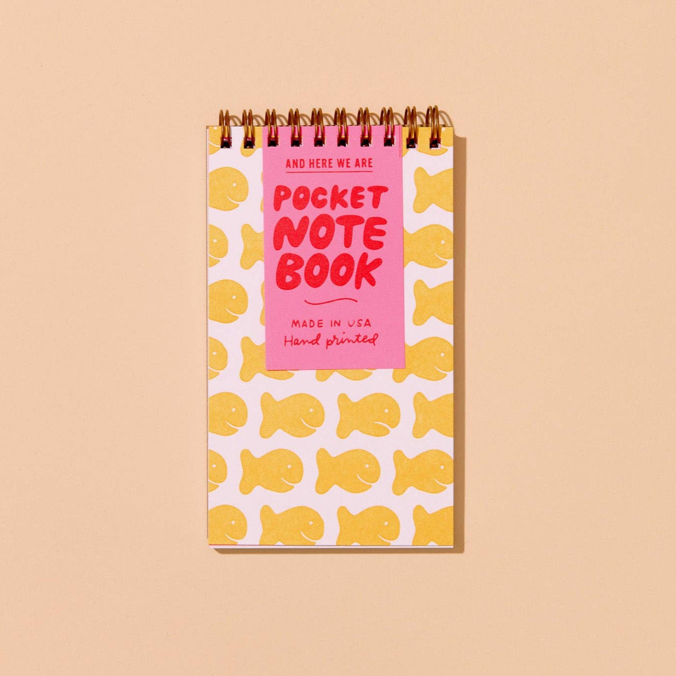 spiral bound, pocket notebook with a goldfish cracker design
