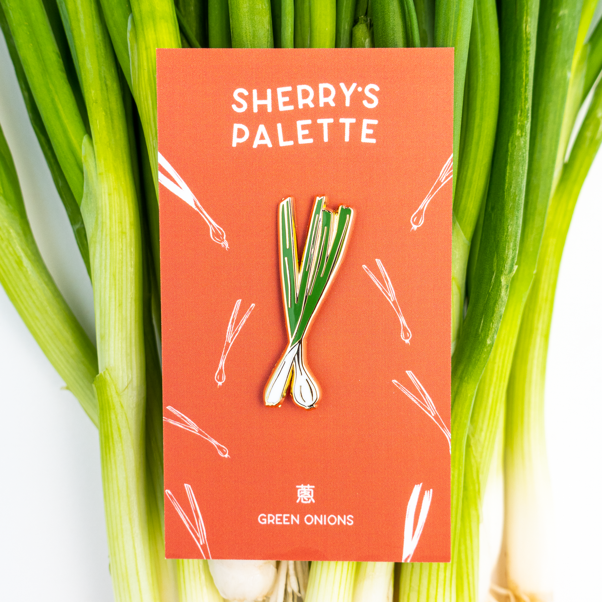 Green onion enamel pin