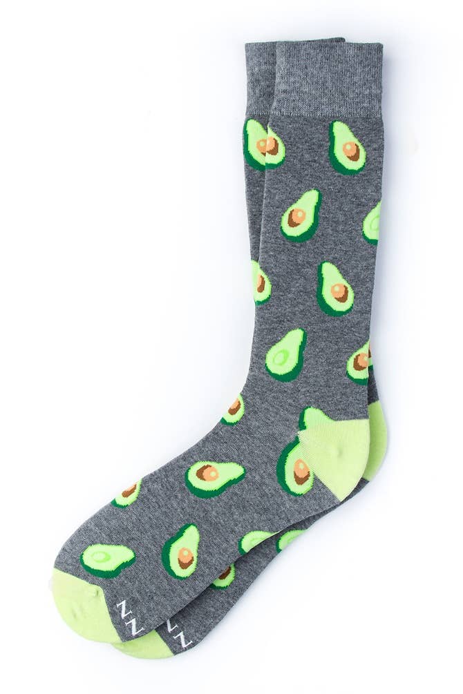 Gray sock with avocado pattern on a white background