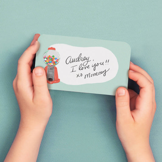 Single gumball pocket note with a message on it