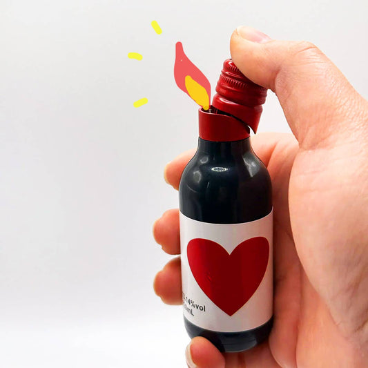 Image showcasing how the heart wine bottle lighter would operate once filled with lighter fluid