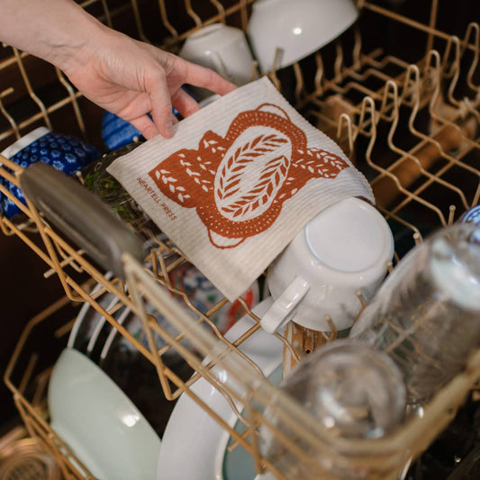 the reusable bread pattern kitchen sponge cloth inside a dish washer