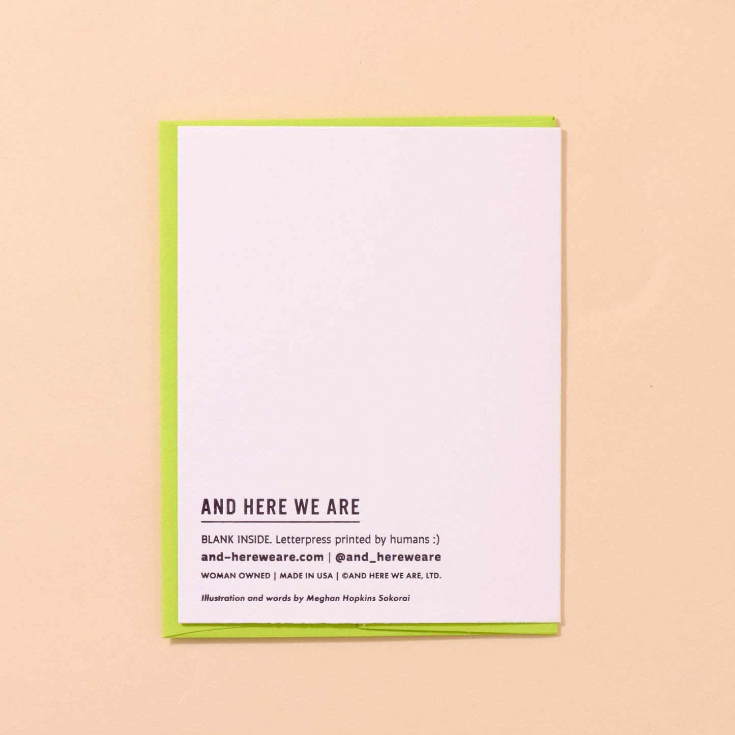 Card with branding text on a beige background