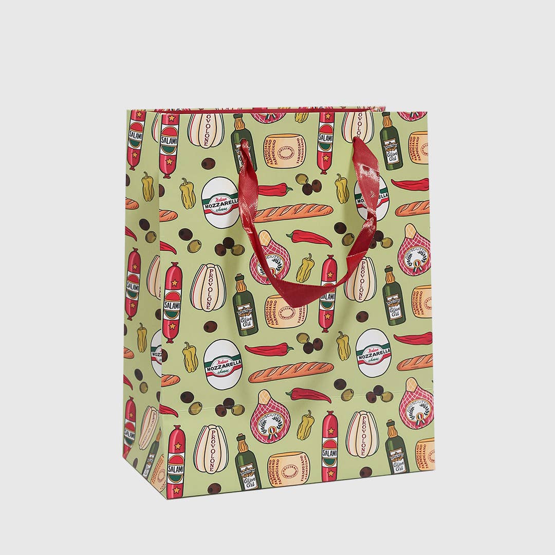 gift bag with green background color. Design features salami, prosciutto, bread, peppers, olives and cheese on it