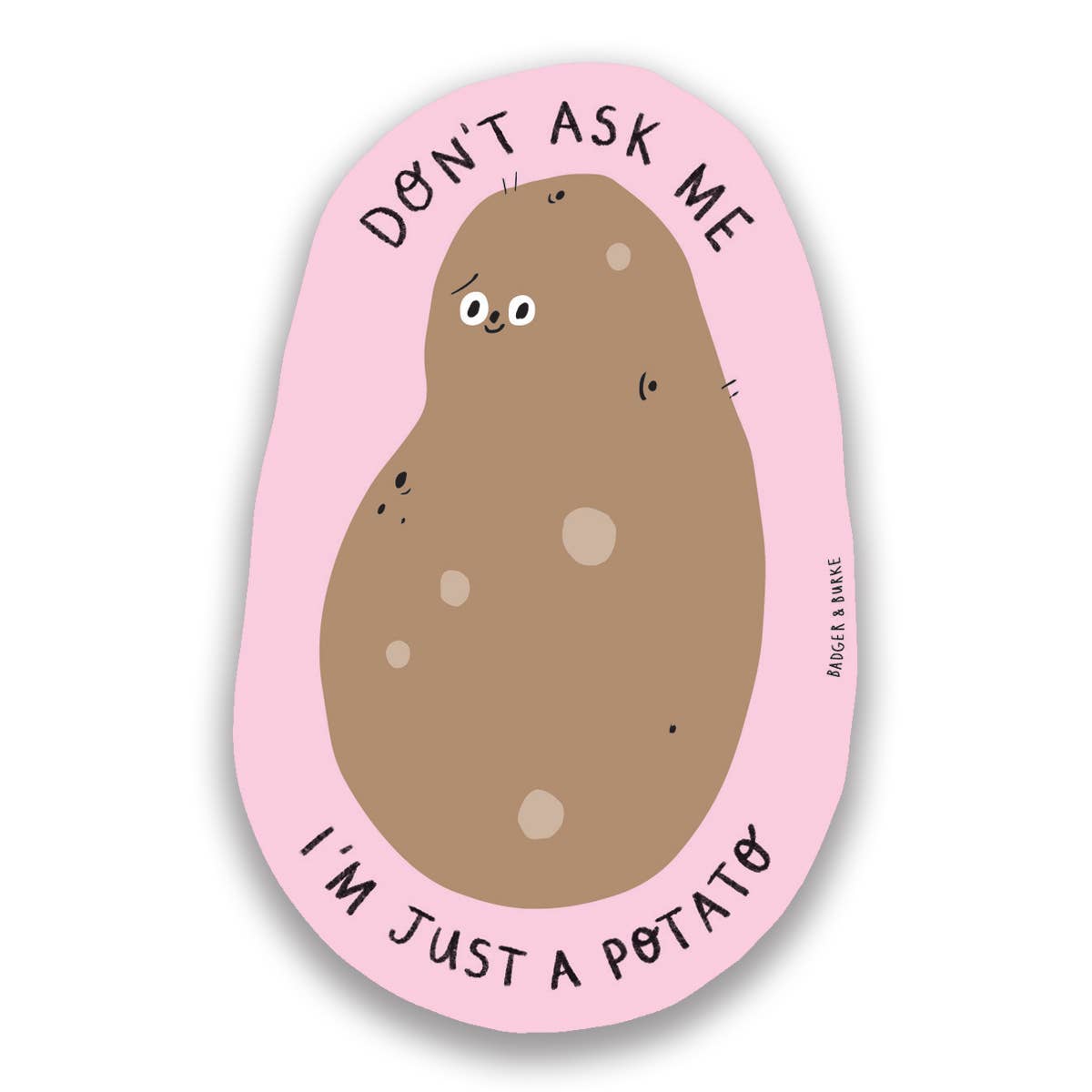 oval shaped sticker, light pink background with a smiley faced russet potato on it. Text reads "Don't ask me I'm just a potato"
