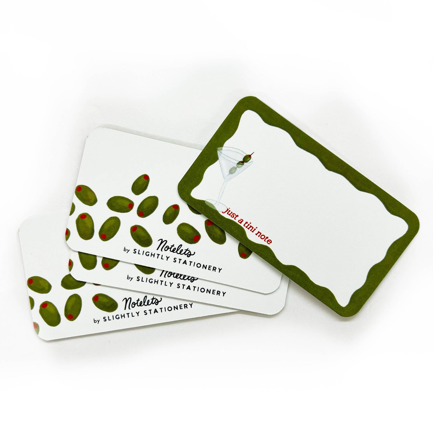 Set of stationery items with green and red design on a white background