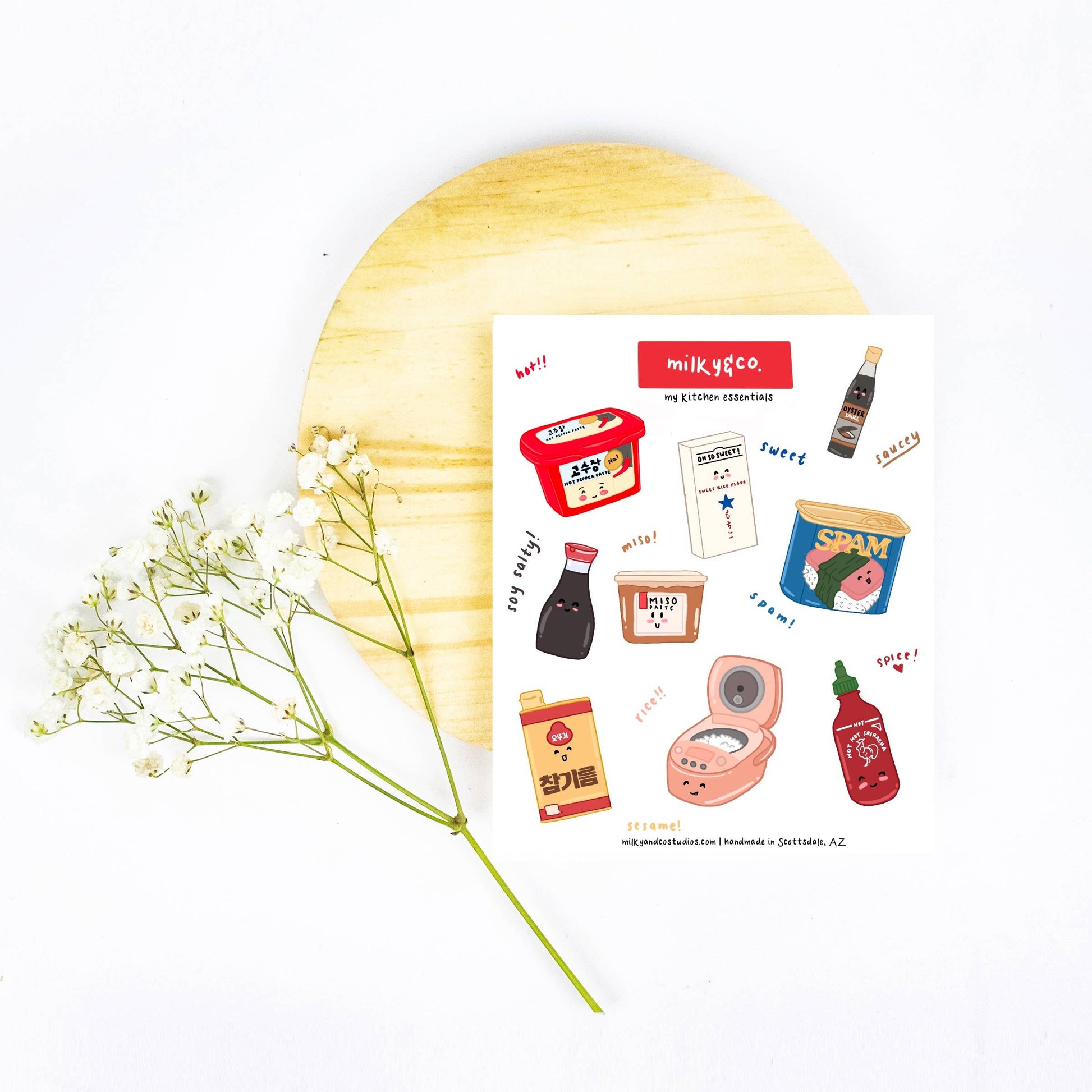 sticker sheet filled with various asian kitchen seasoning essentials -- gochujang, sesame oil, mochiko rice flour, soy sauce, soy bean paste, rice cooker, sriracha, spam, oyster sauce