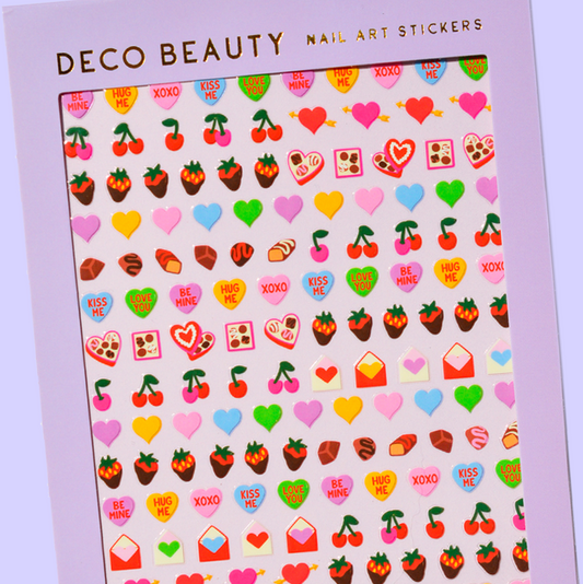 Packaging of Deco Beauty nail art stickers with colorful designs on a purple background.