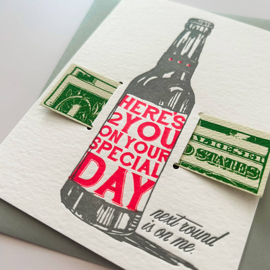 Card with a bottle graphic and text on a white background