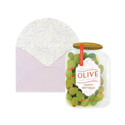 Jar of olives with a 'Happy Birthday' card on a white background
