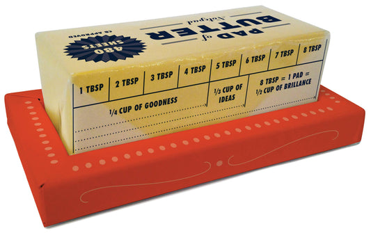 Notepad made to look like a stick of butter with measurement labels on a white background