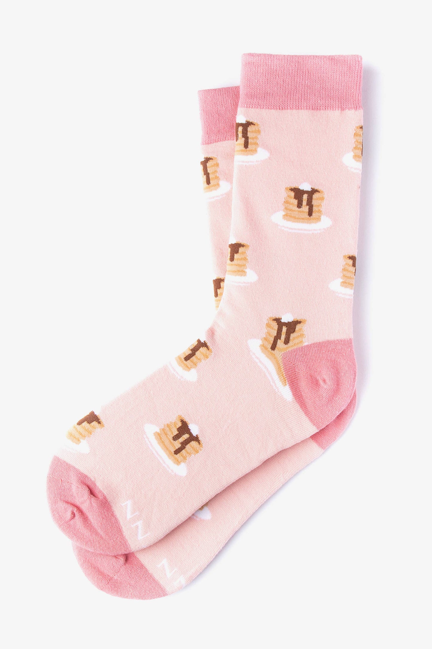 Pink socks designed with stacks of pancakes on a white background