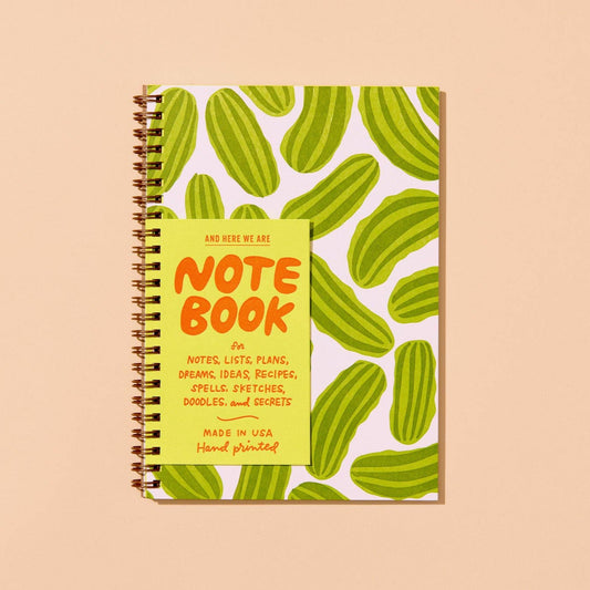 lined notebook which features a pickle design