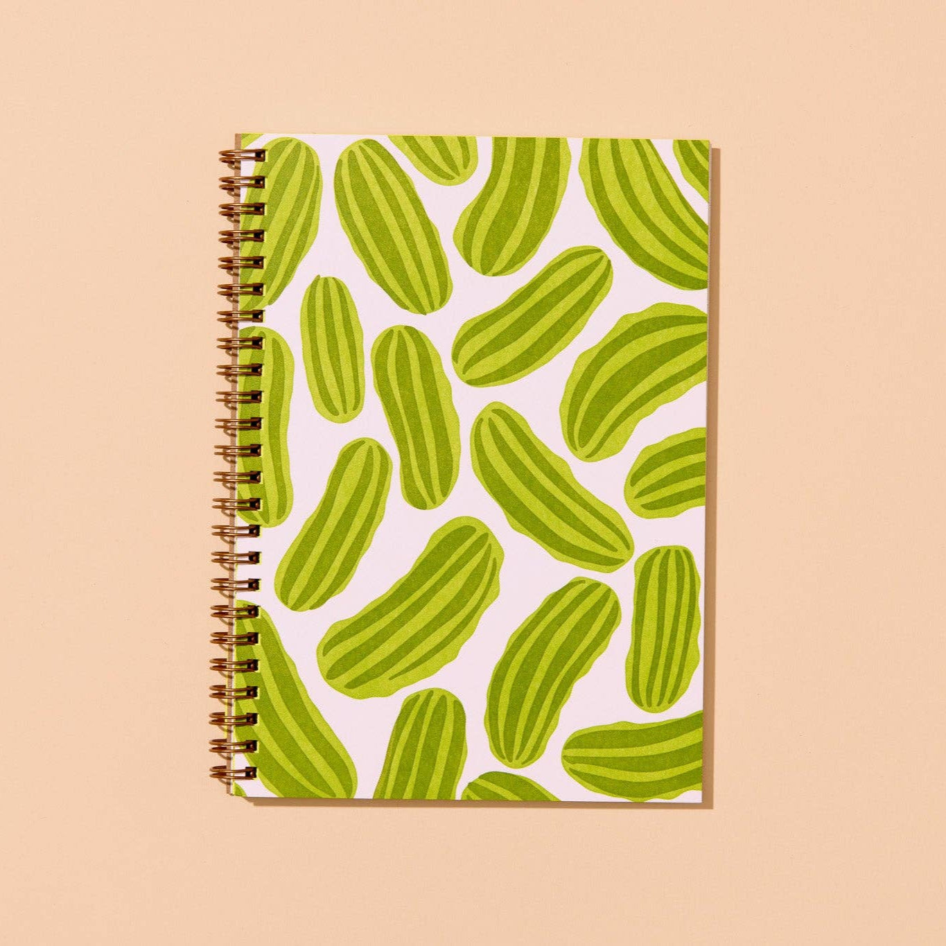 spiral bound notebook featuring a pickle design