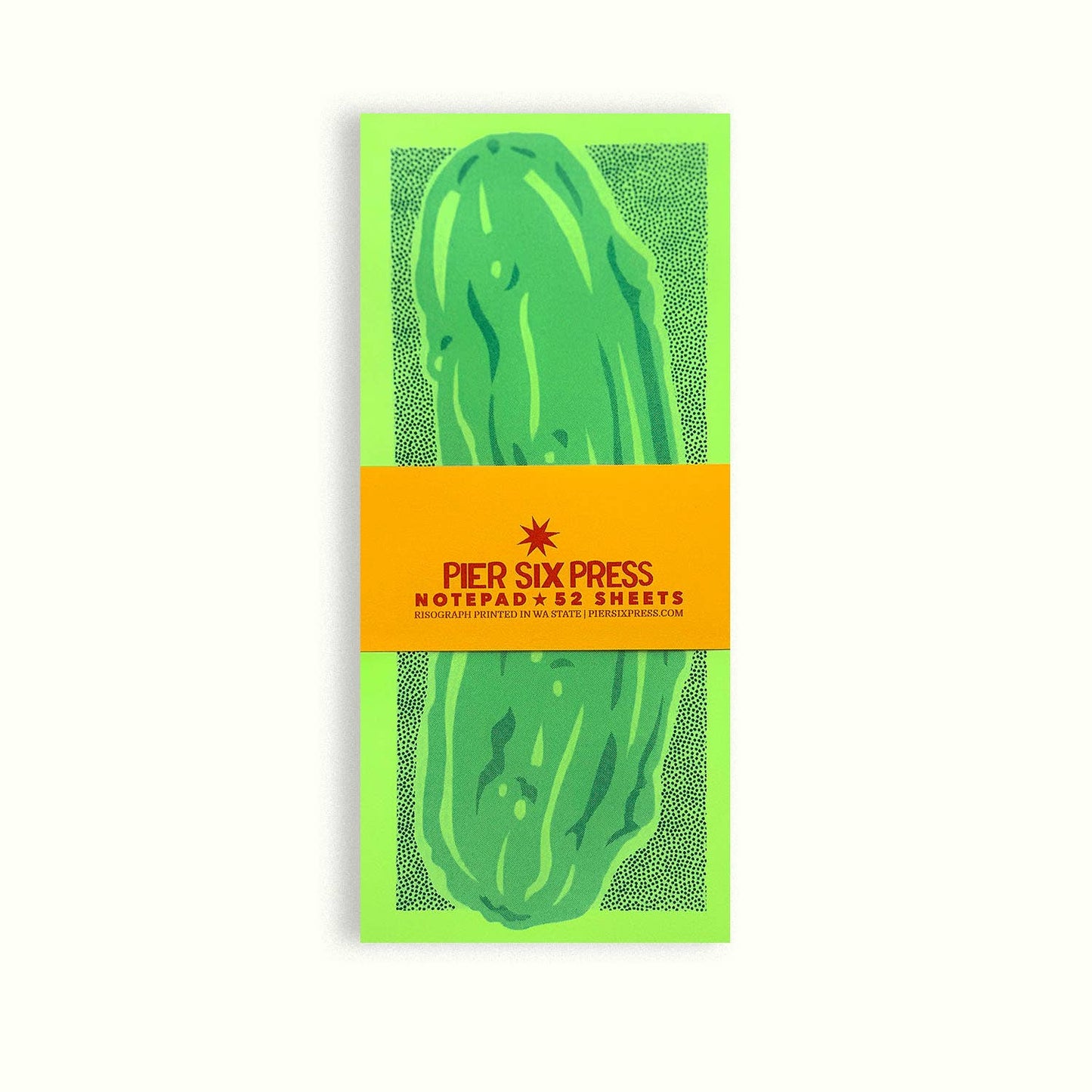 Notepad with green pickle design and Pier Six Press branding on a white background
