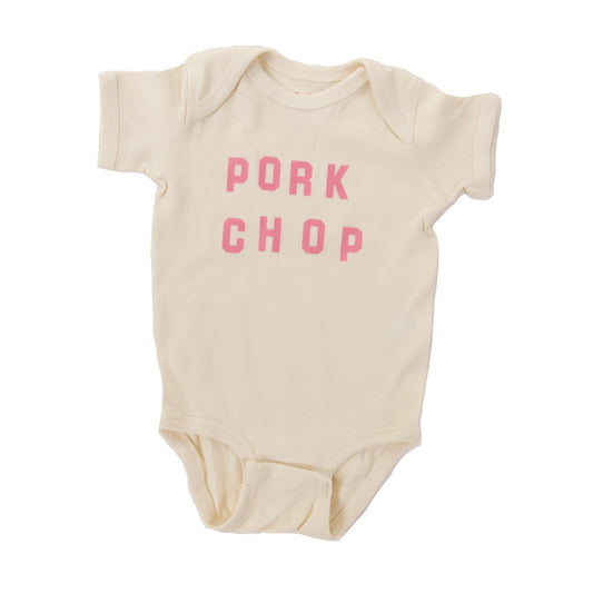 Baby onesie that reads "Pork Chop" in pink. Comes in 3 sizes - 6m, 12m and 18m