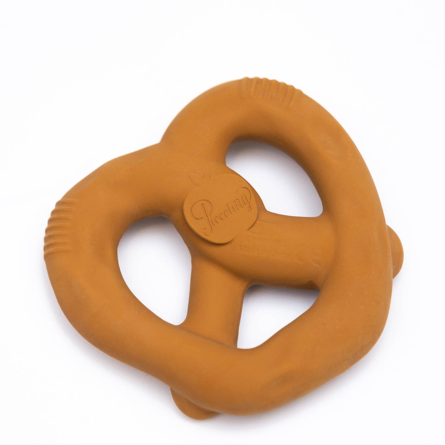 Orange teething pretzel with a brand logo on a white background