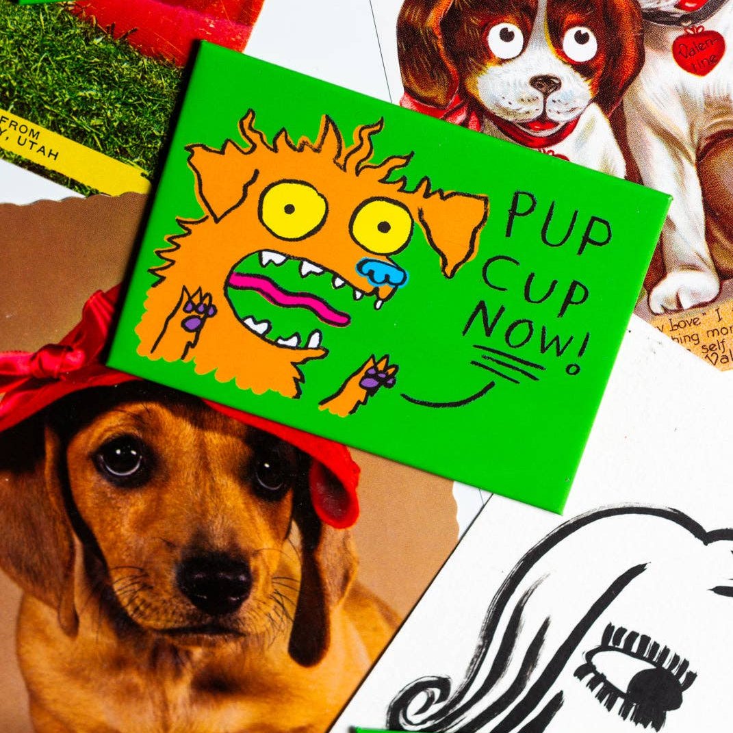 magnet with a crazed dog on it and text that reads "pup cup now!"