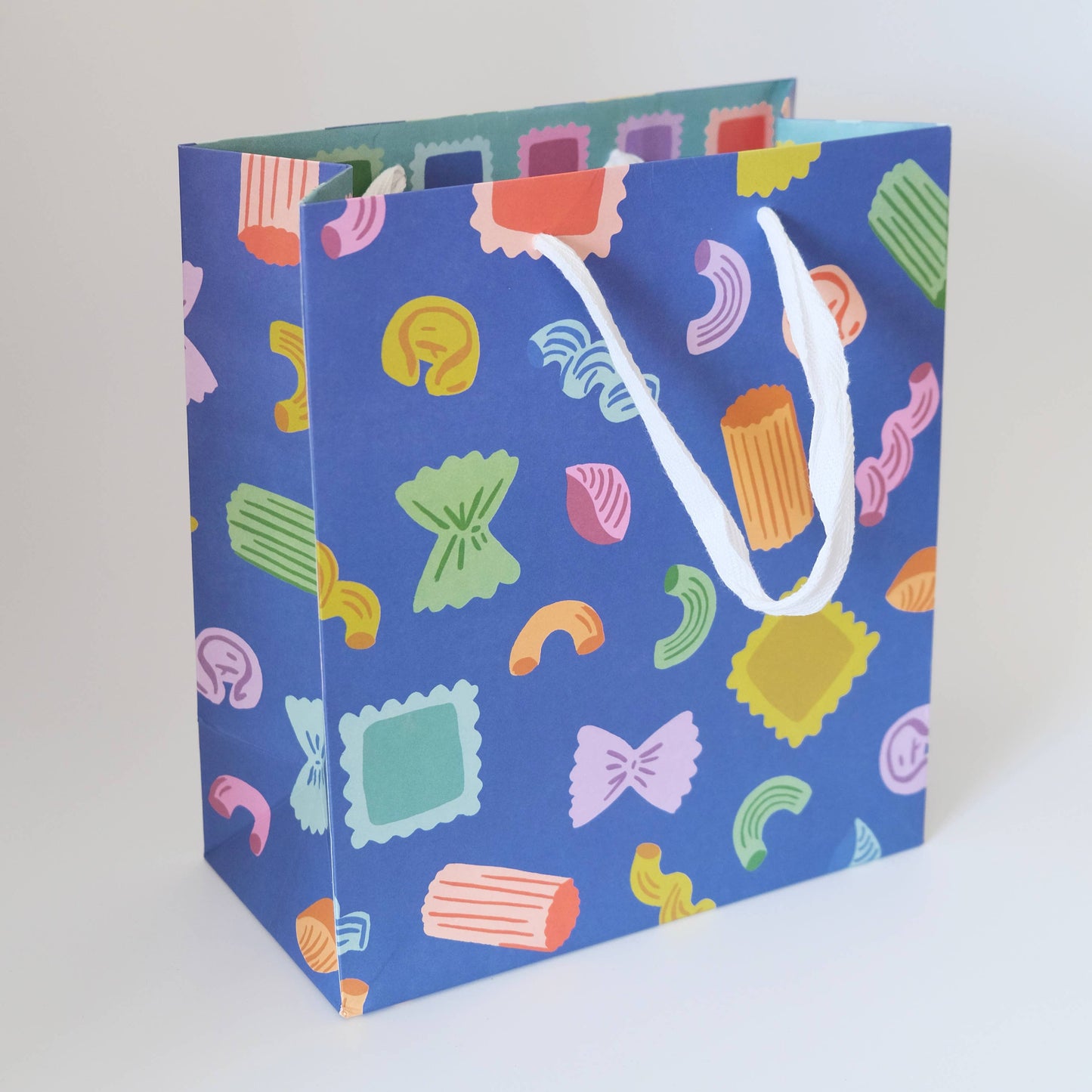 vibrant gift bag with different pastas in a rainbow of colors