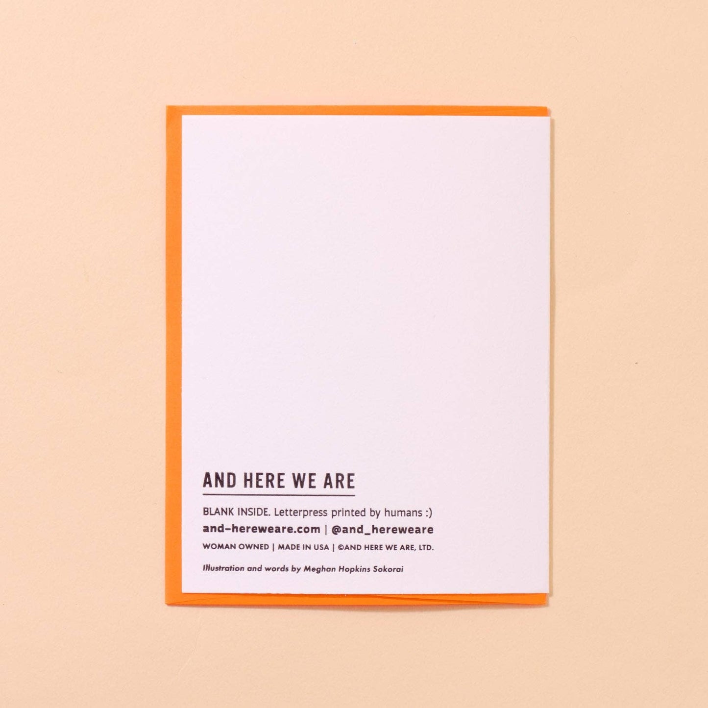 White card with text on a beige background