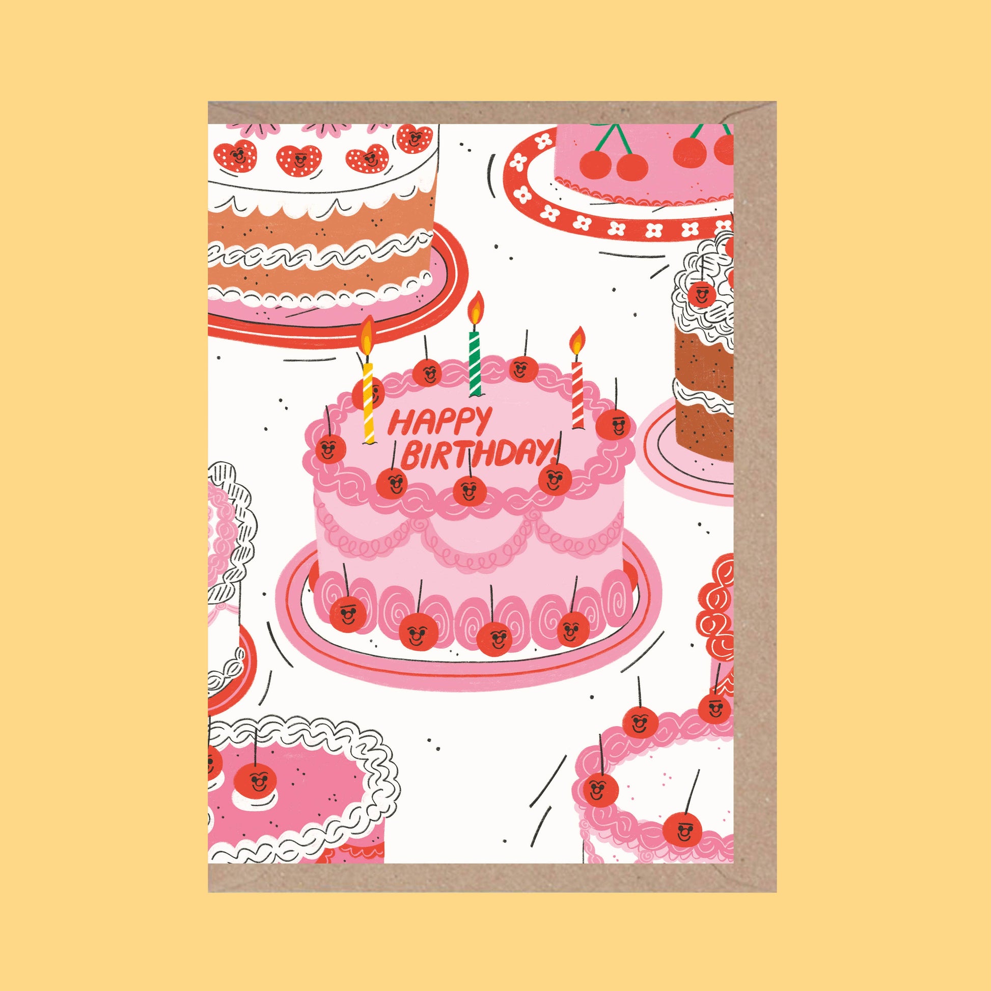 birthday greeting card with various cakes on it. The one in center reads "happy birthday" and has 3 candles on it.
