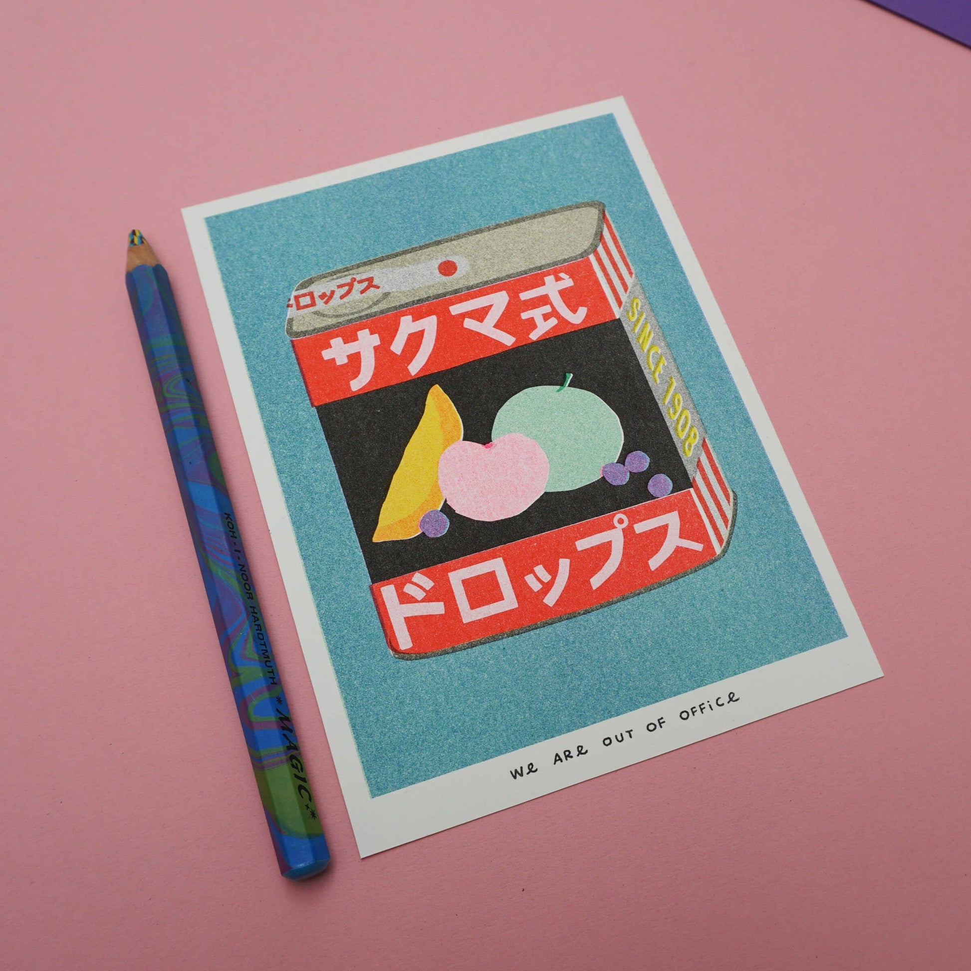 Risograph print illustration of Sakuma Drops with colorful design and pencil on a pink background