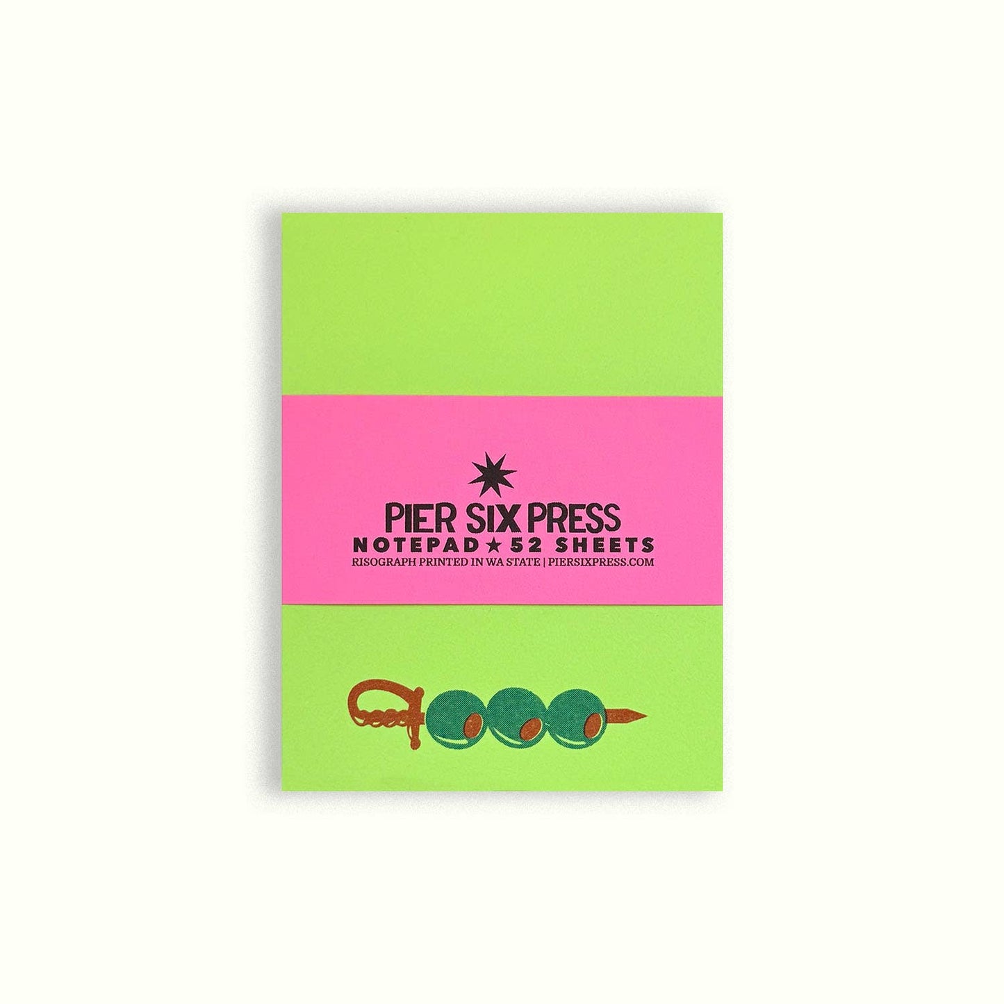 Pier Six Press notepad with green and pink design and a skewer of olives at the bottom on a white background