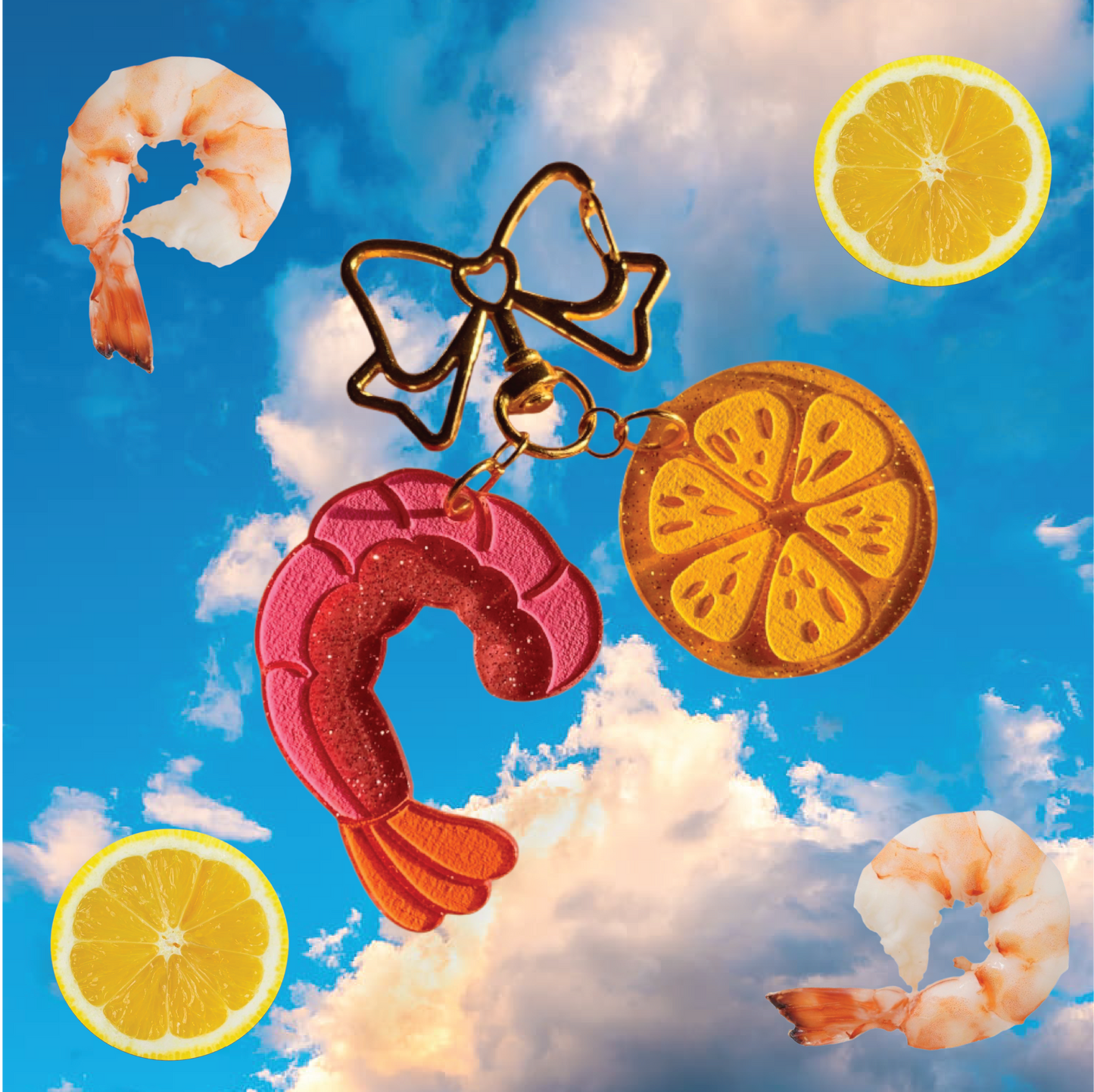 A keychain/bag charm with charms resembling shrimp and lemon slices against a blue sky with clouds and lemons.