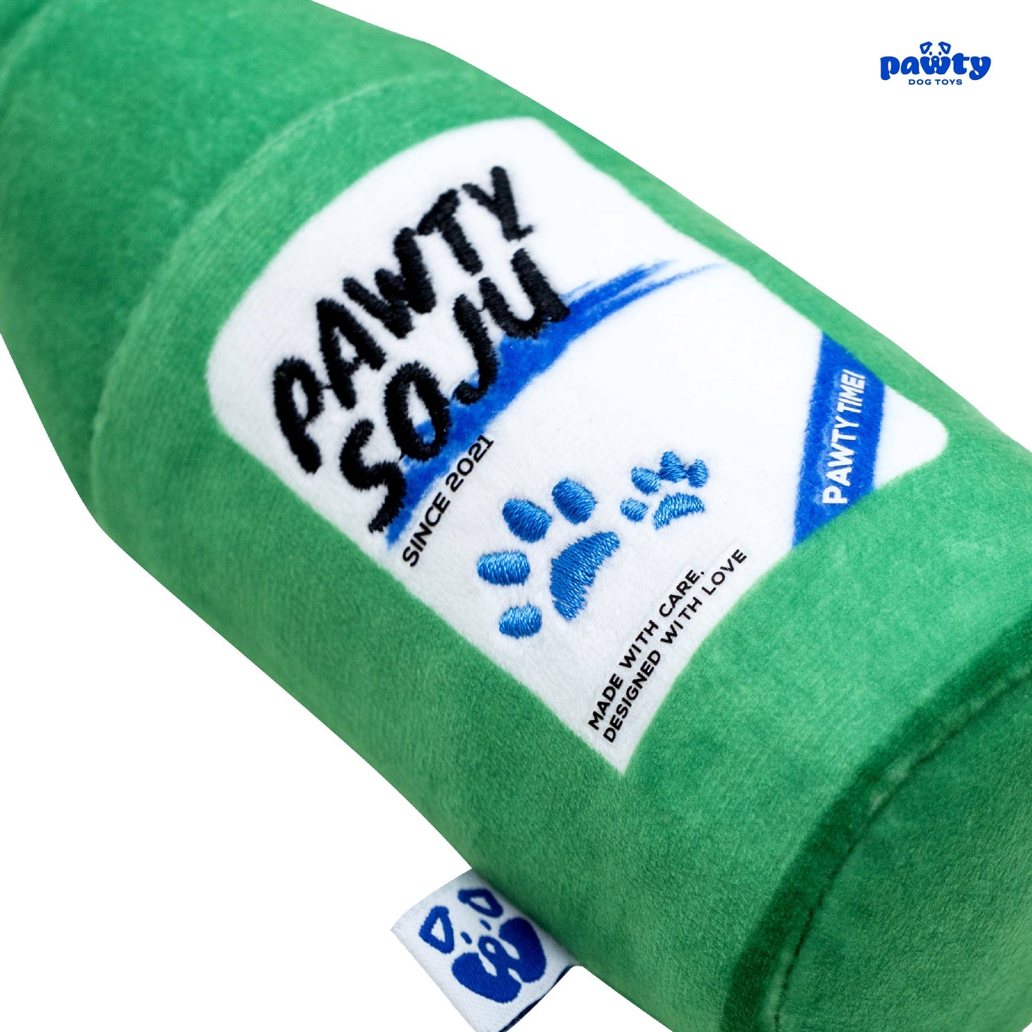 Green soju bottle-shaped dog toy with 'PAWTY SOJU' branding on a white background