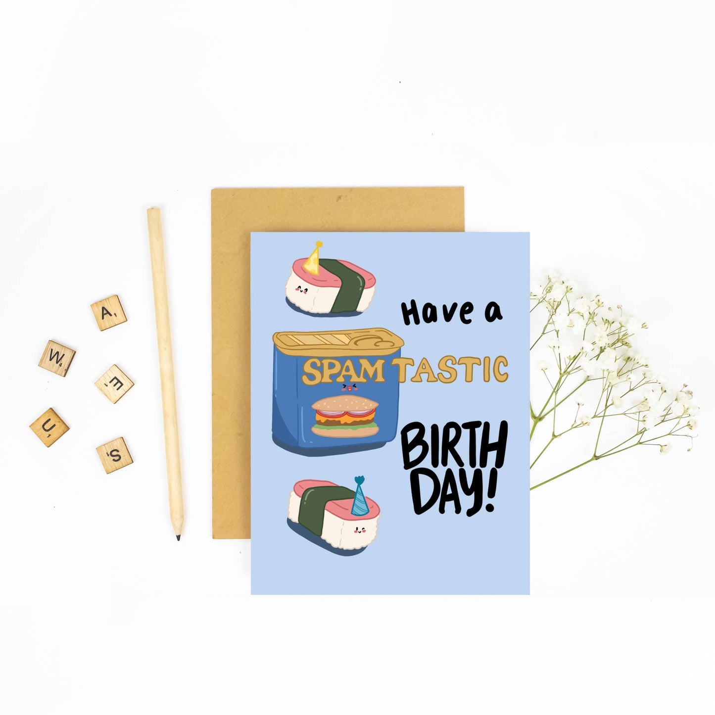 birthday card with a spam can and spam musubi on it. Text reads "Have a spam-tastic birthday"