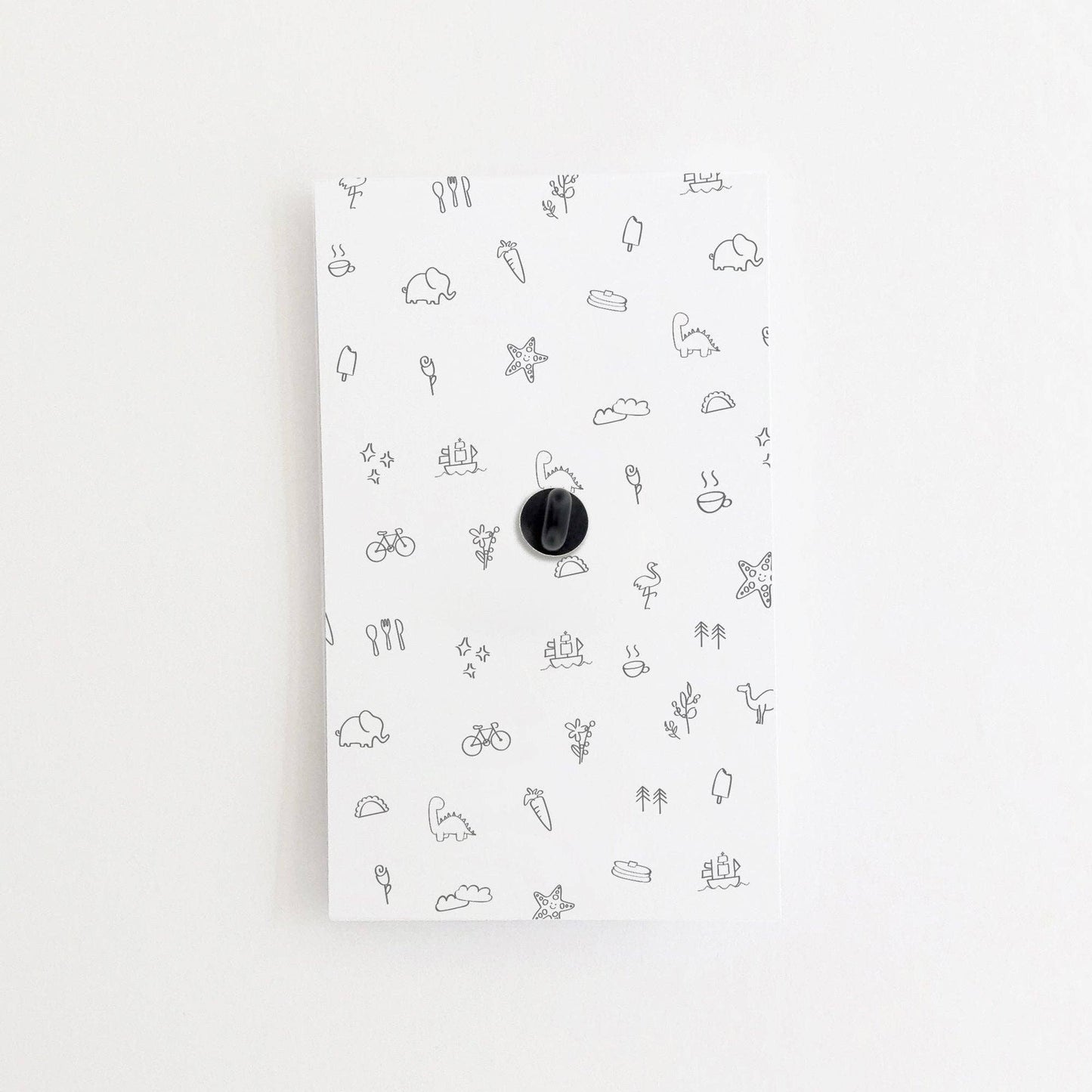 Card backing of spam musubi pin