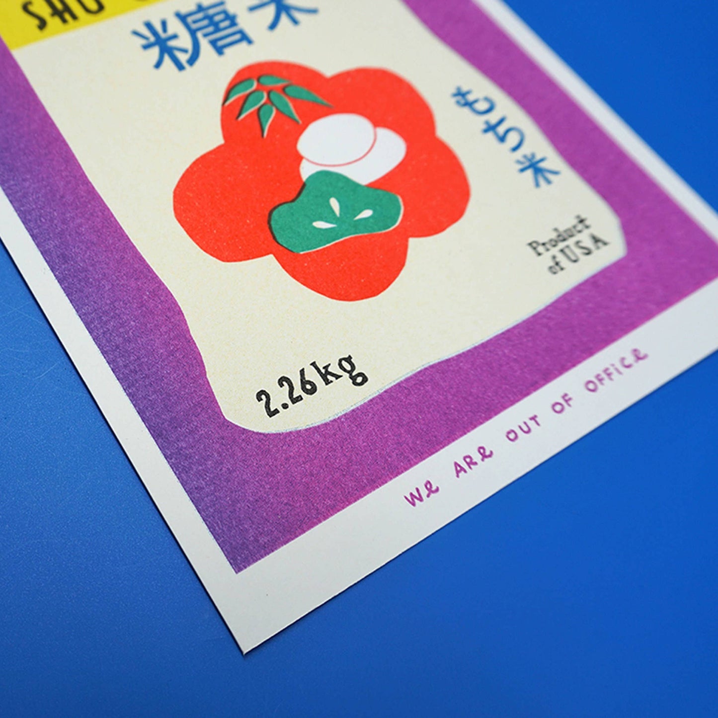 Close-up of a sweet rice bag label with a red flower design on a blue background