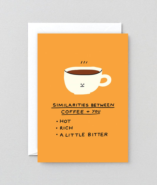 Greeting card with a coffe mug on it. Text below reads "Similarities between coffee + you -- hot, rich, a little bitter"