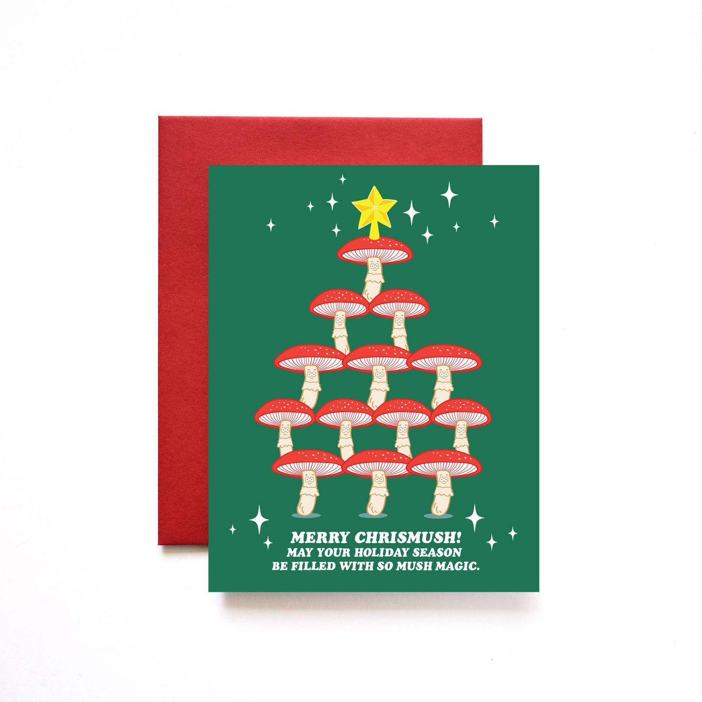Holiday greeting card that reads "Merry Chrismush! May your holiday season be filled with so much magic" underneath a tree made out of mushrooms with a star at the very top.