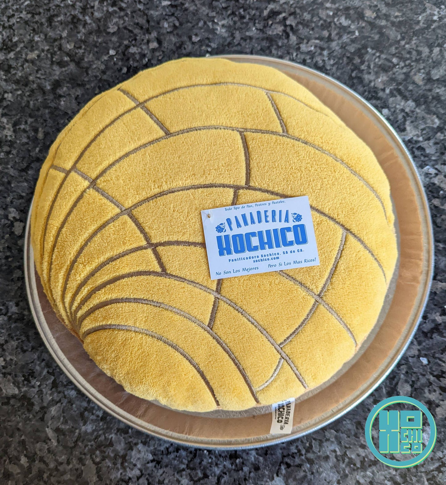 Yellow pastel colored pan dulce pillow.