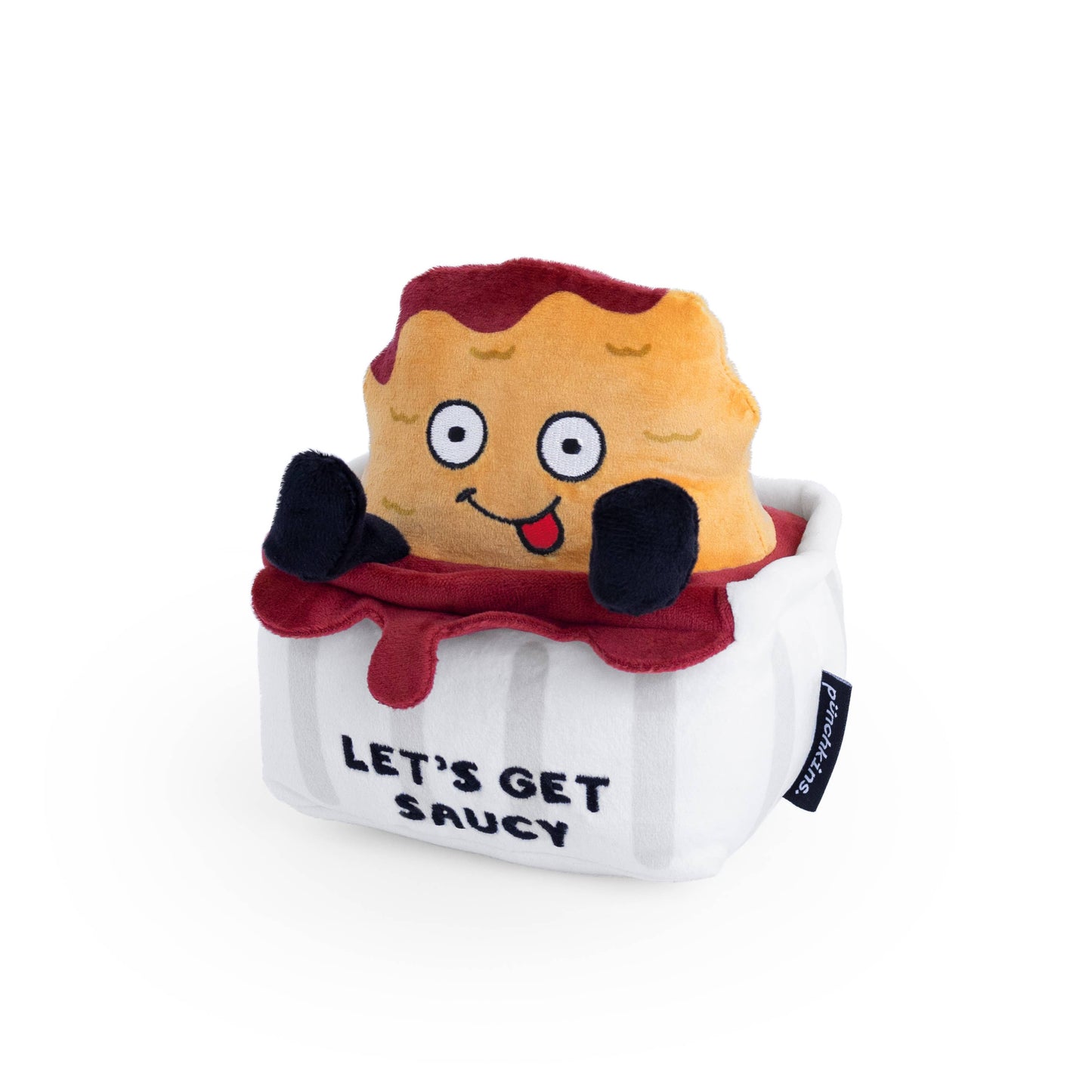 Chicken Nugget dunked in sauce plush toy -- on sauce container it reads "Let's Get Saucy"