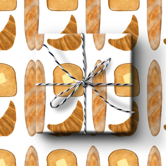 Bread gift wrap includes toast with butter, baguttes, and croissants.