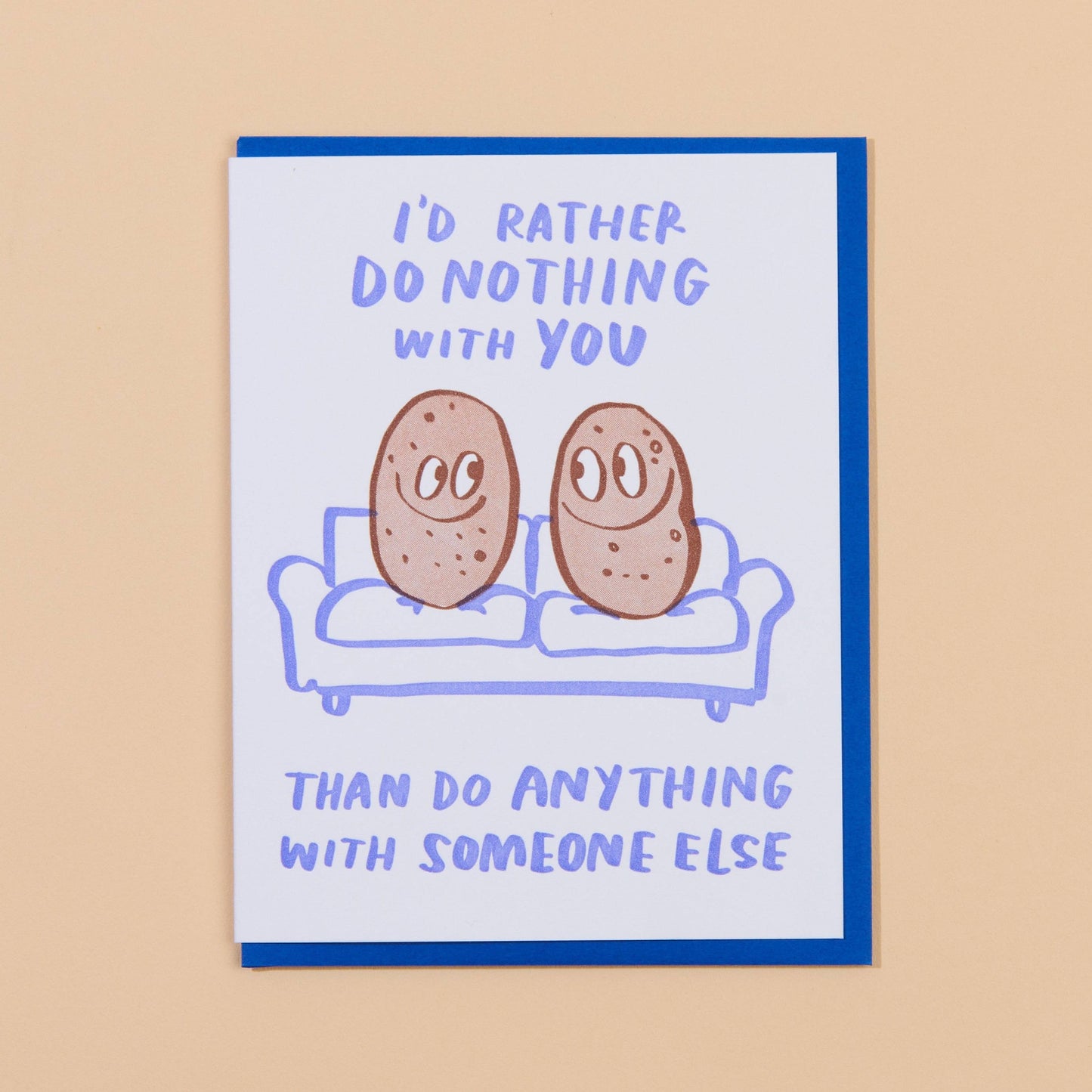 Greeting card that reads "I'd rather do nothing with you than do anything with someone else" with two potatoes on a couch