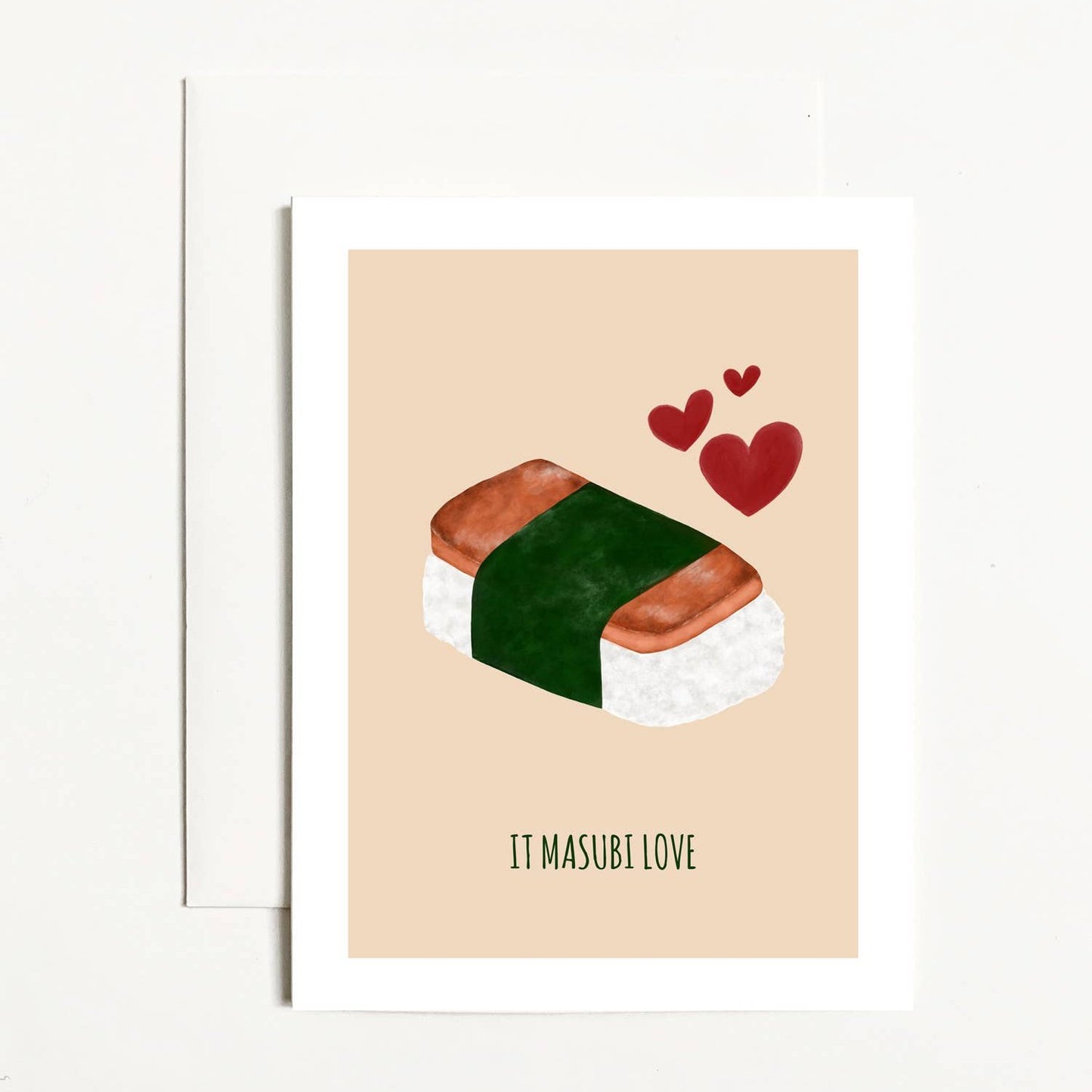 Greeting card with spam musubi on the front with 3 red hearts. Text reads: It Masubi Love