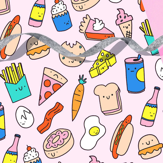 Wrapping paper with various, colorful snack foods on it including hot dogs, fries, pizza, bacon, eggs, carrots, cheese, sandwiches, pie and drinks