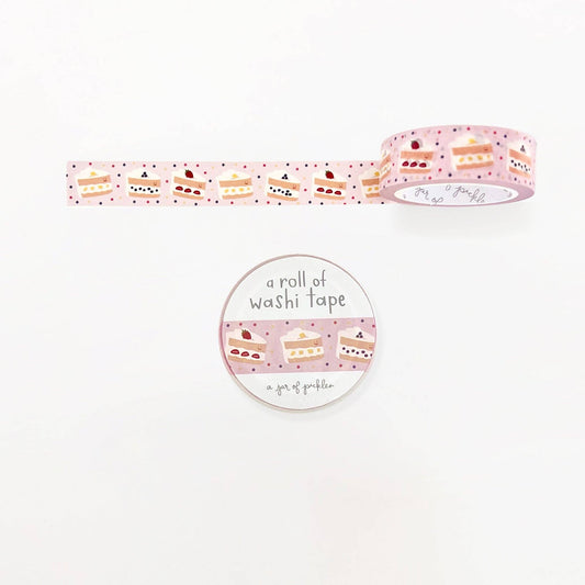 Washi tape with mostly pink background and slices of cake all over