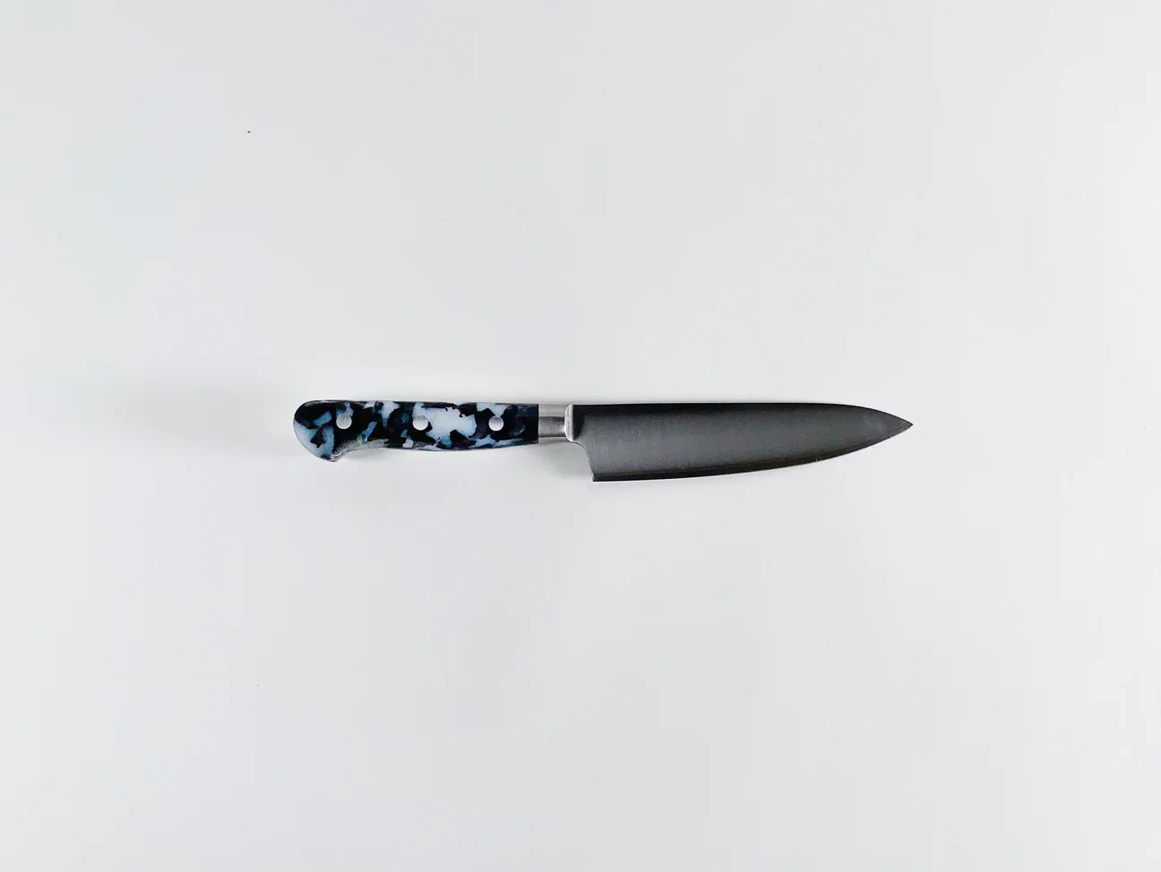 Utility knife with black and white handle