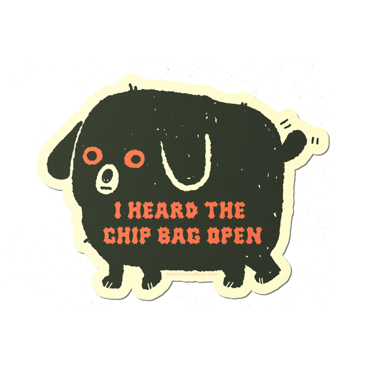 Vinyl sticker of black dog that reads "I heard the chip bag open"