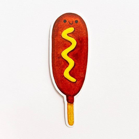 Corndog sticker with some mustard
