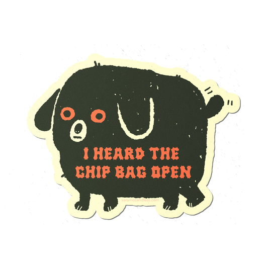 Vinyl sticker of black dog that reads "I heard the chip bag open" 