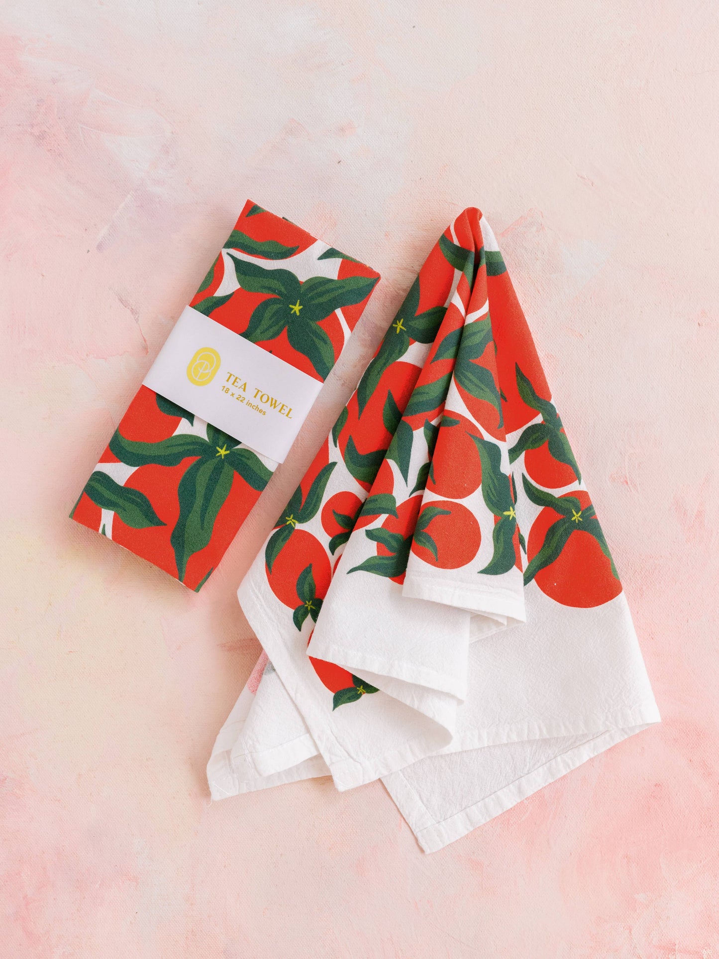Flour sack tea towel or kitchen towel with tomatoes on it